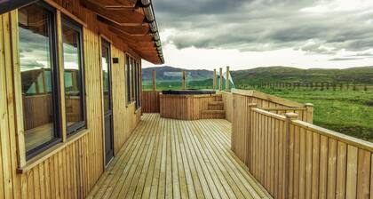 Amazing cabin with warm interior, hot tub, fire place, projector & magical views