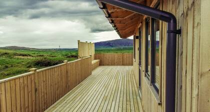 Amazing cabin with warm interior, hot tub, fire place, projector & magical views