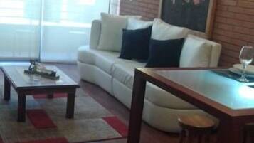 Standard Loft, 1 Queen Bed | Living area | Flat-screen TV