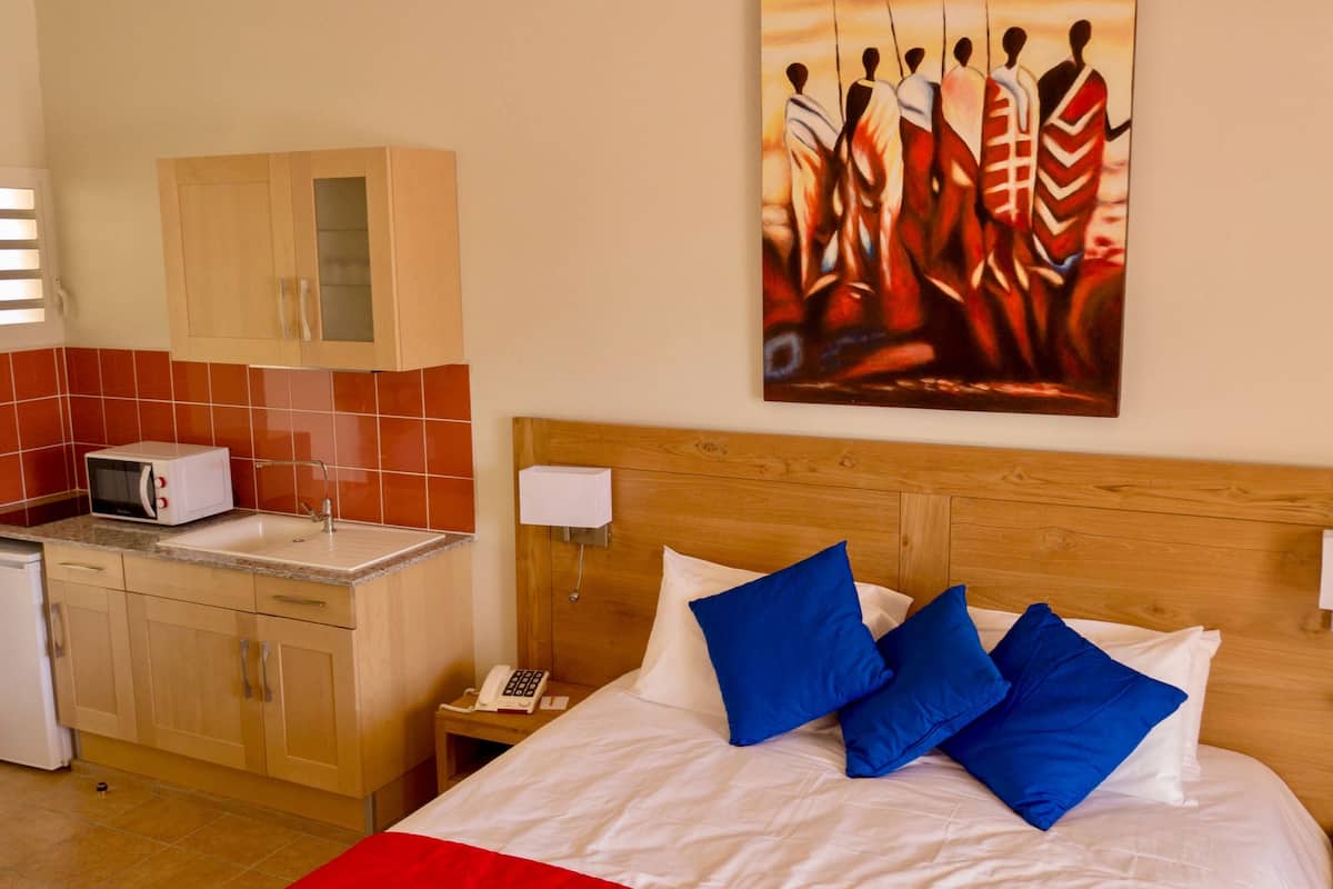 deluxe suite, 1 king bed, non smoking, sea view (201 anthurium) | 8 bedrooms, premium bedding, select comfort beds, minibar