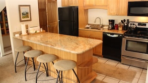 Condo, 2 Bedrooms | Private kitchen | Fridge, microwave, oven, stovetop