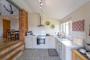 Fridge, microwave, highchair, dining tables