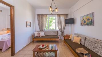 Apartamento, 1 quarto | Área de estar