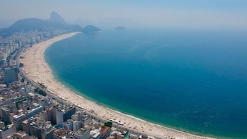 Beach nearby, white sand, free beach cabanas, beach umbrellas