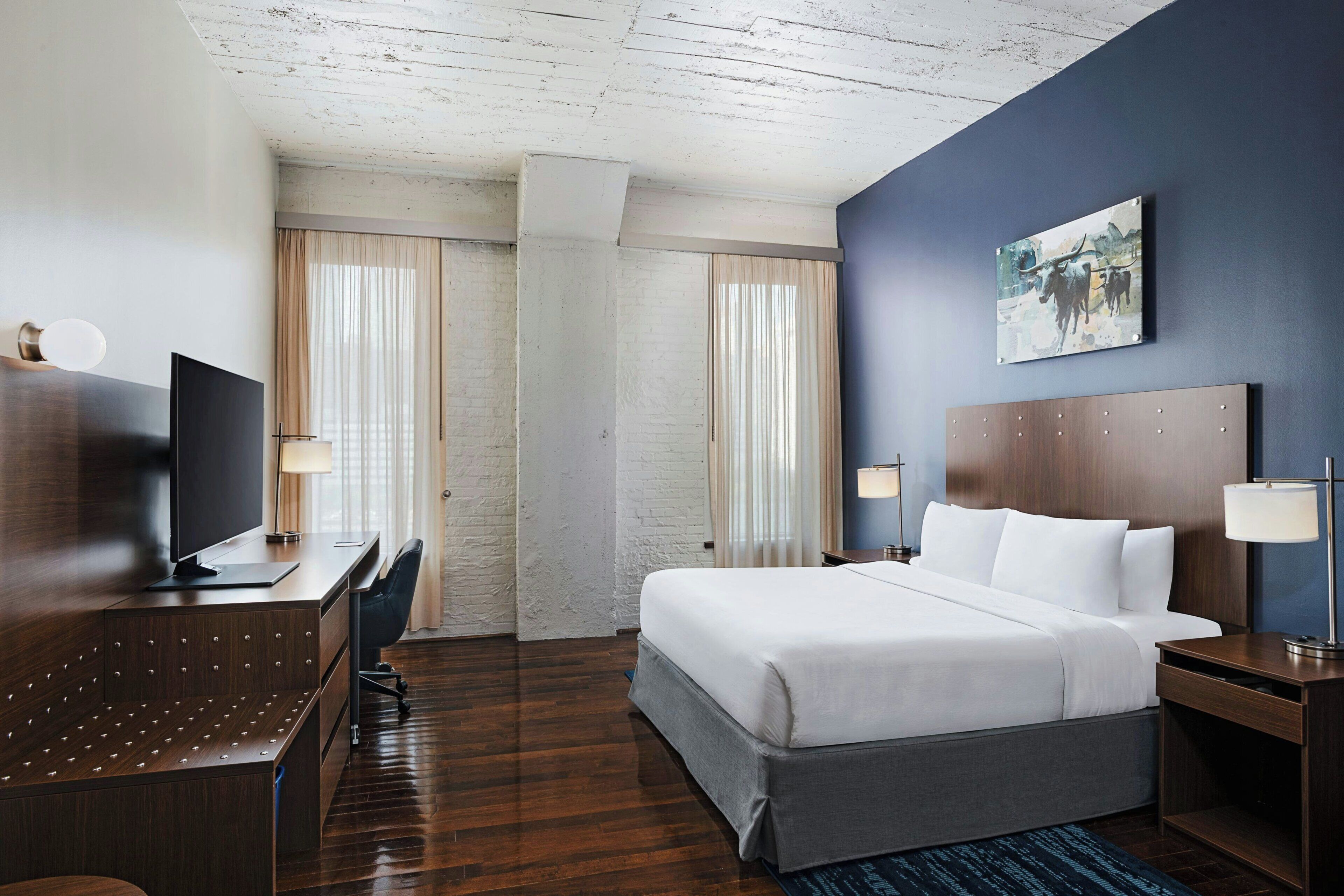 Room, 1 King Bed | Desk, blackout drapes, iron/ironing board, free WiFi
