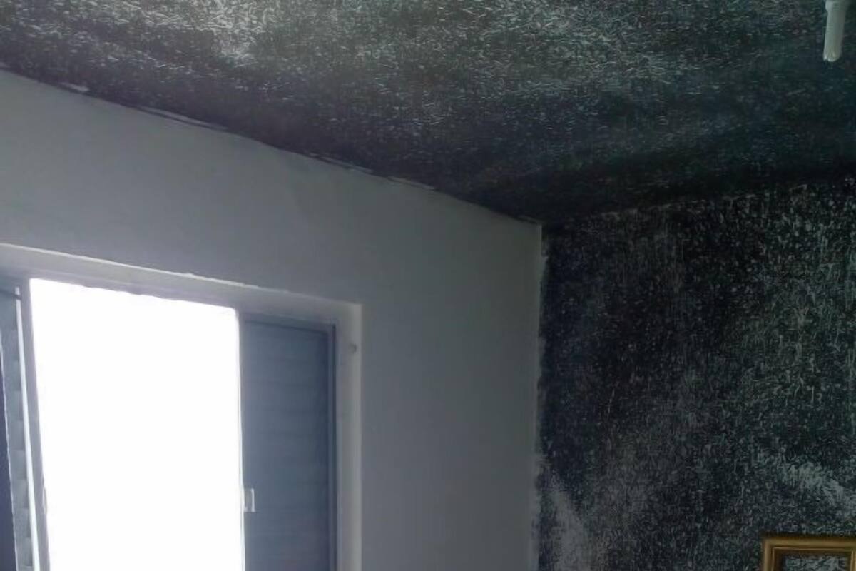 Habitación cuádruple económica, varias camas, para fumadores, vista al océano | Cortinas blackout, tabla de planchar con plancha y wifi gratis