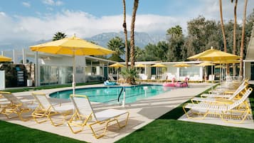 Outdoor pool, open 7 AM to 10 PM, pool umbrellas, sun loungers