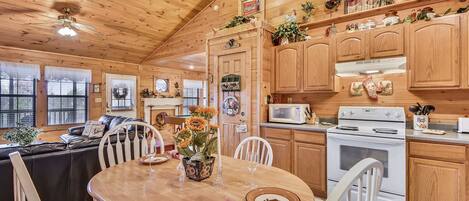 Cabin, 1 Bedroom | Private kitchen | Fridge, oven, stovetop, coffee/tea maker