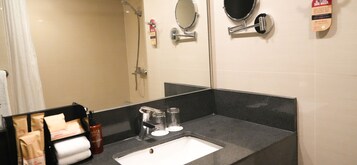 Hydromassage showerhead, eco-friendly toiletries, hair dryer, slippers