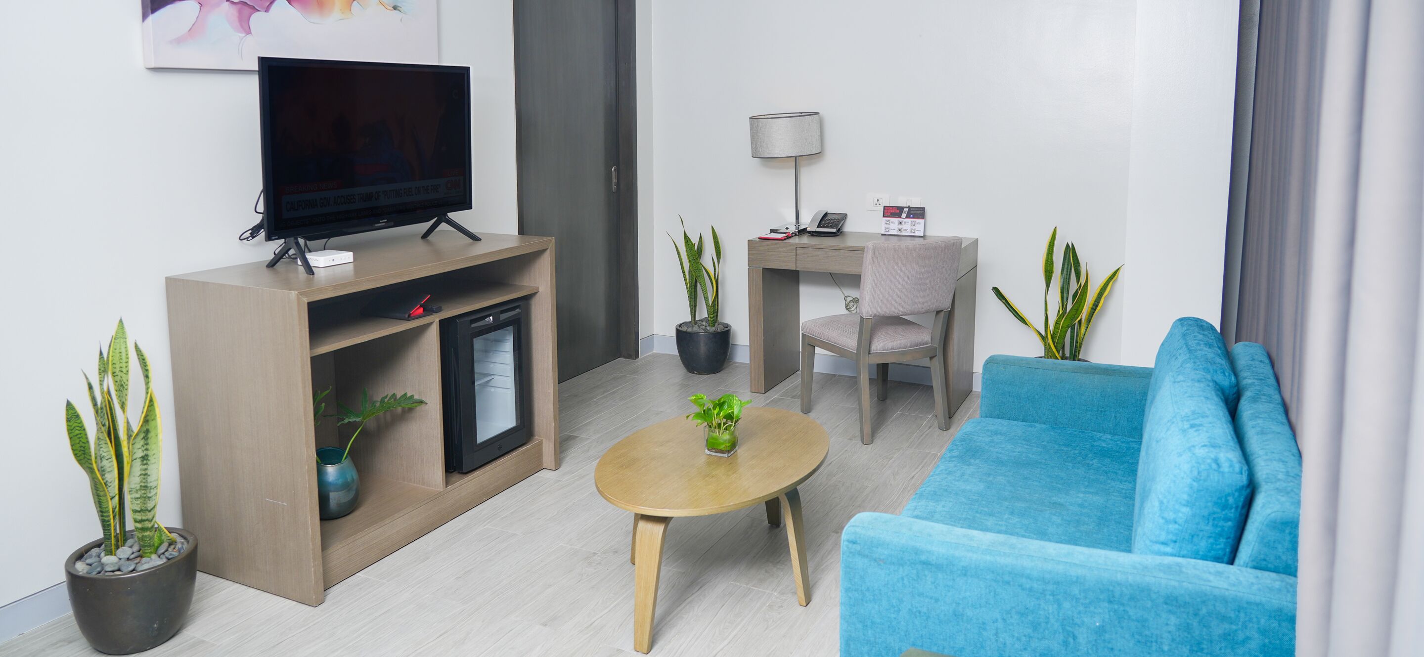 1 bedroom suite with living room | living area | 32-inch smart tv with cable channels