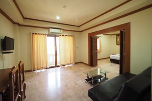 Suite | Sala de estar | Una televisión