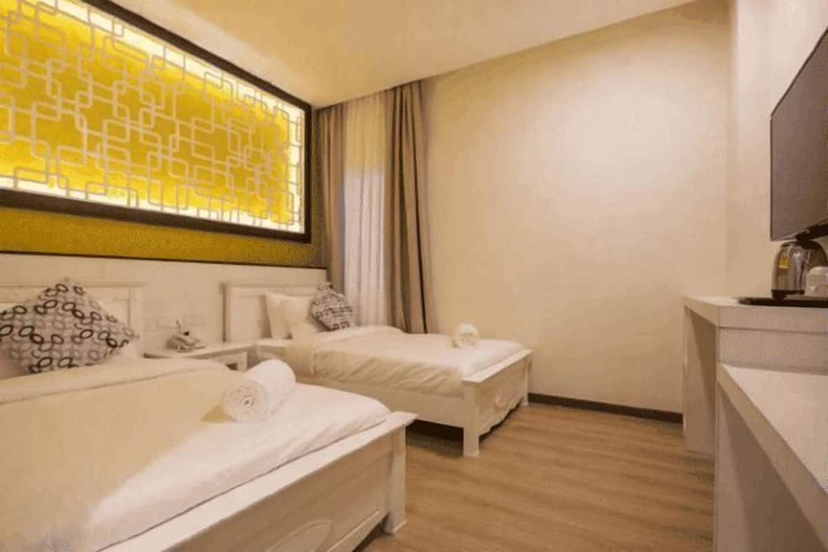 Desk, iron/ironing board, free cribs/infant beds, rollaway beds