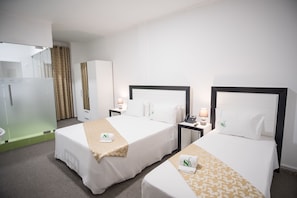 Family Room | Minibar, in-room safe, desk, free WiFi - SH Boutique Hotel (São Tomé)