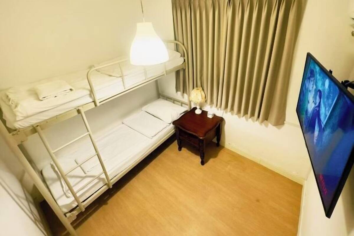 Laptop workspace, free WiFi, bed sheets