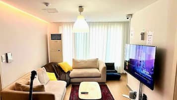 50-inch flat-screen TV with digital channels, TV, Netflix