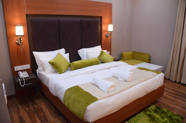 Chambre Double Deluxe, 1 très grand lit | Salle de séjour