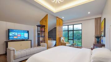 Luxury Studio Suite, 1 King Bed, Bathtub, River View | Blackout drapes, free WiFi, bed sheets
