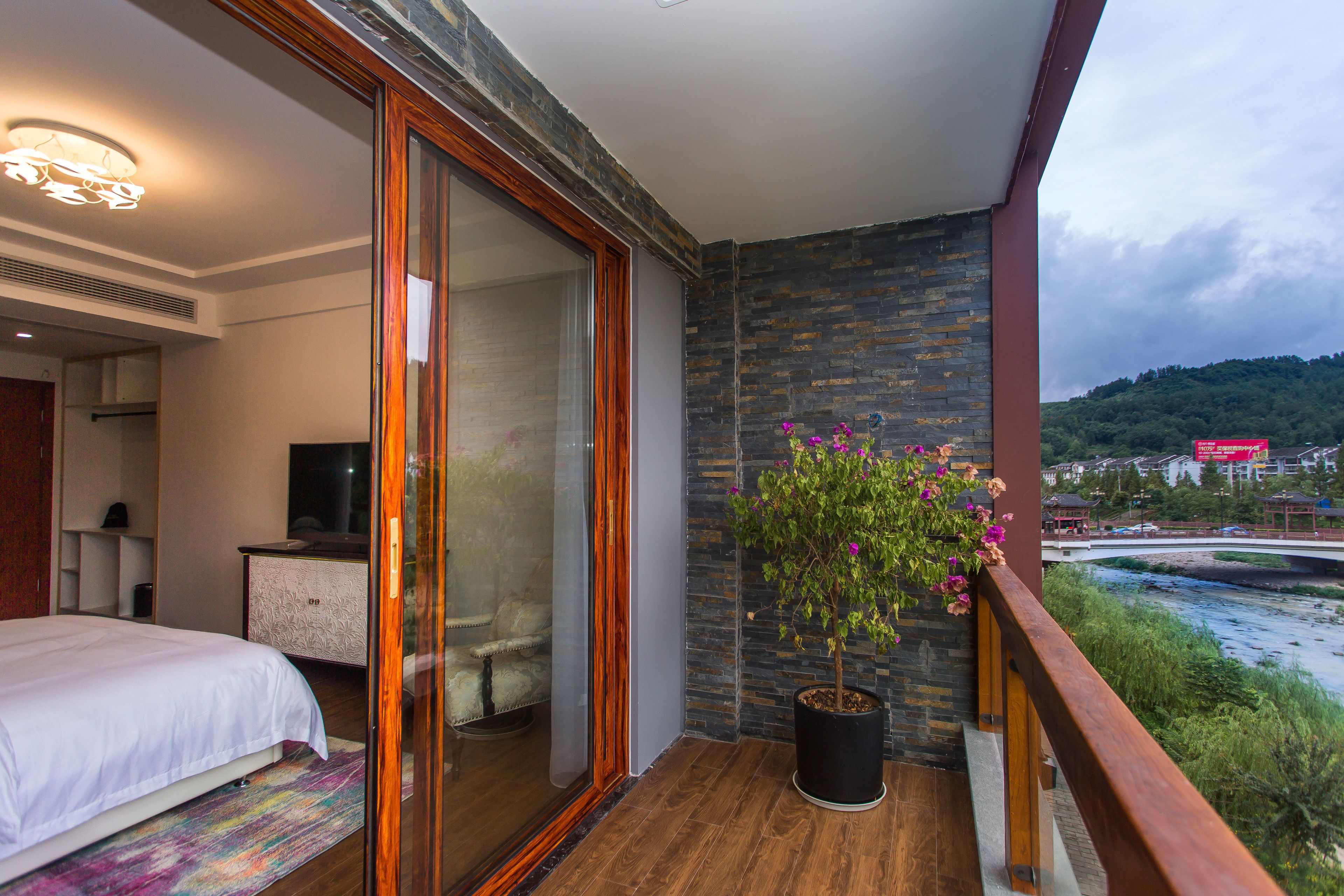 deluxe double room, 1 king bed, balcony, river view | blackout curtains, free wifi, bed sheets