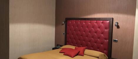 Double Room | Minibar, desk, iron/ironing board, free cribs/infant beds