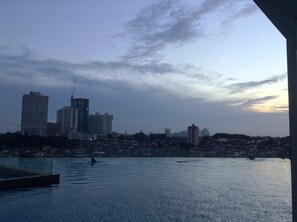 Outdoor pool, an infinity pool - HomeStay D'Esplanade - Sweet Home (Johor Bahru)