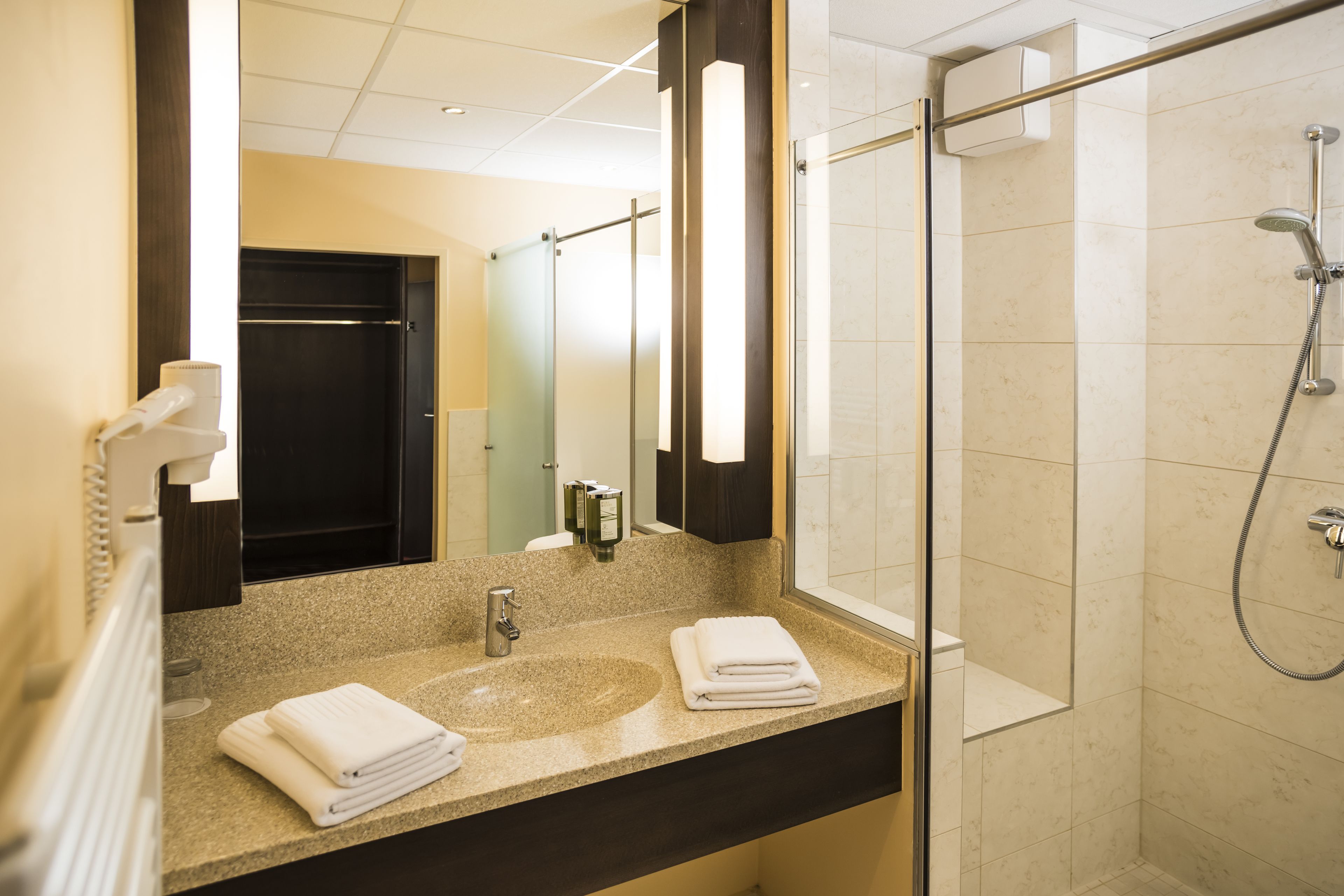 shower, free toiletries, hair dryer, towels