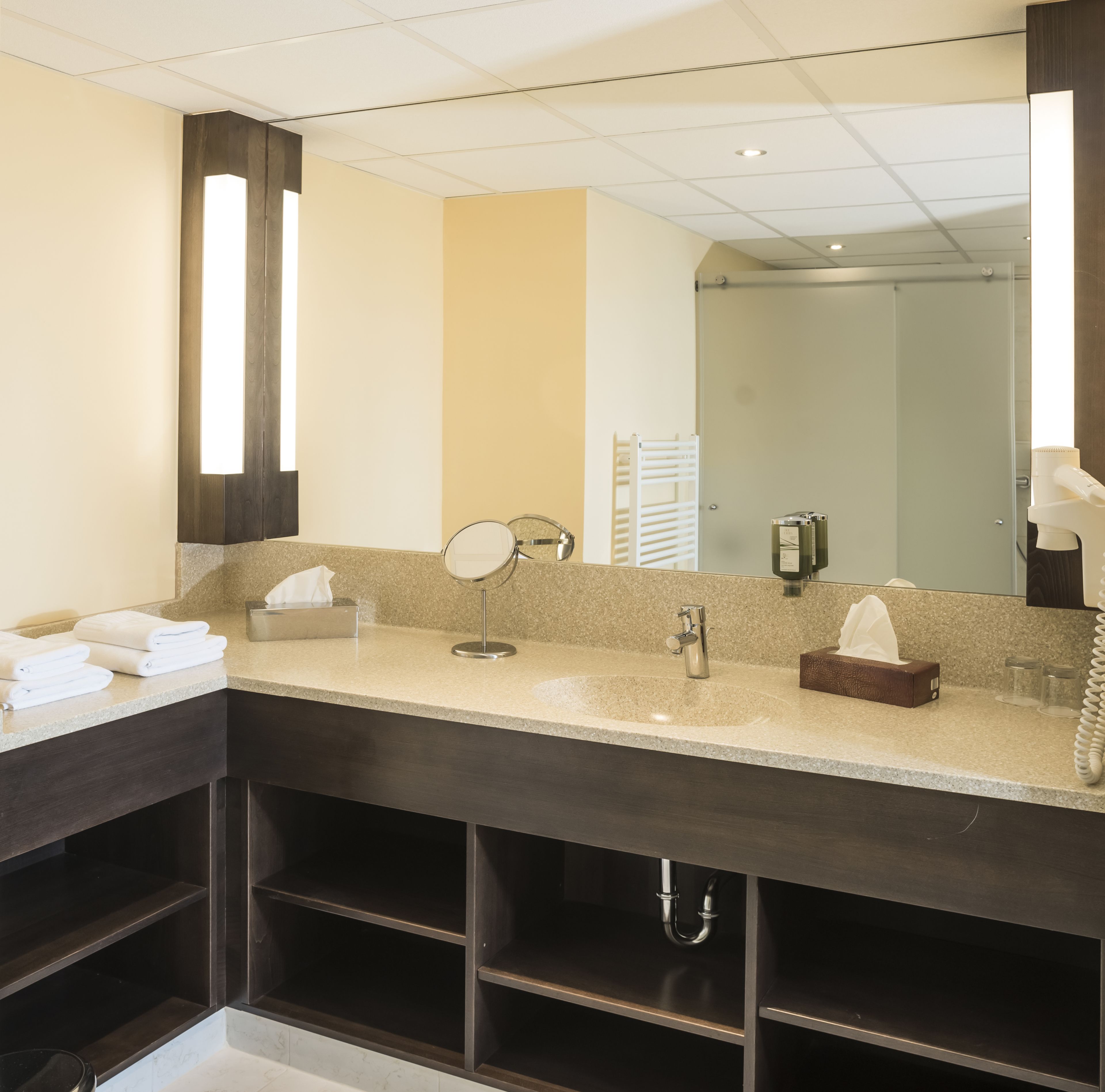 junior suite | bathroom amenities | shower, free toiletries, hair dryer, towels