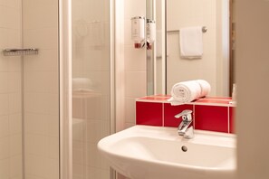 Shower, free toiletries, hair dryer, towels