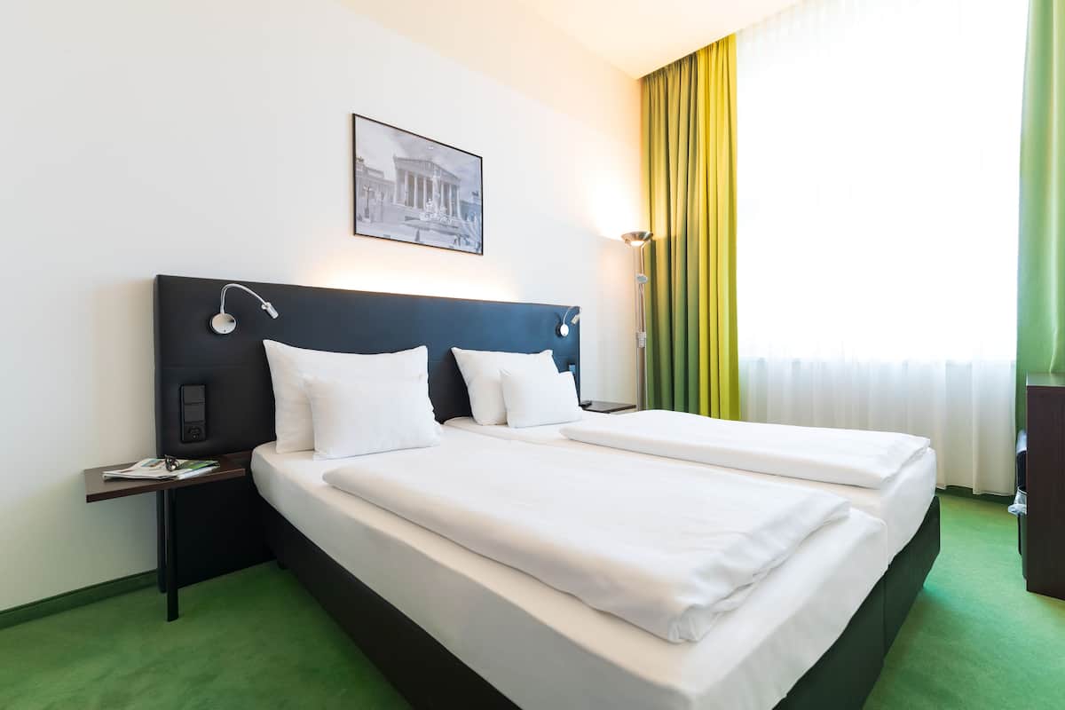 Standaard kamer | 1 slaapkamer, een minibar, een kluis op de kamer, een bureau