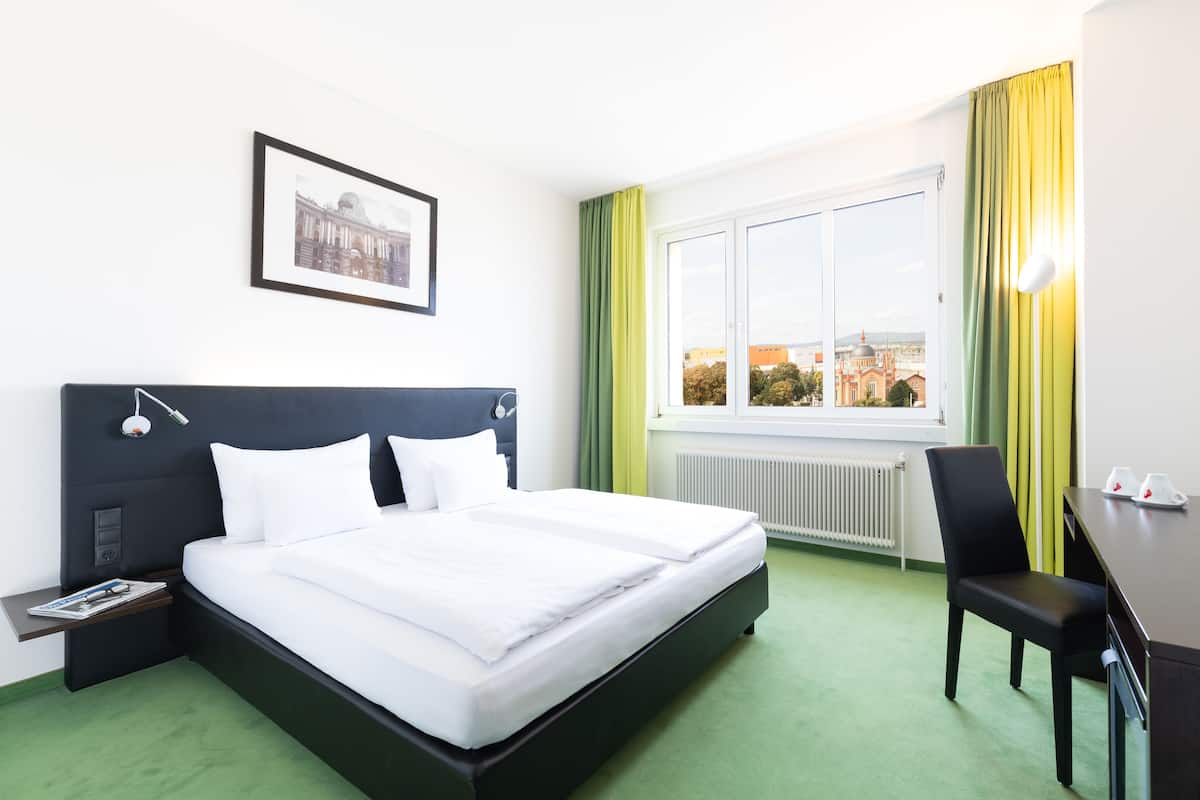 Superior Room | Minibar, in-room safe, desk, laptop workspace
