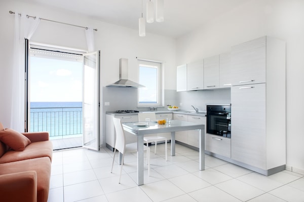 Deluxe Apartment, 1 Bedroom, Sea View | 1 bedroom, premium bedding, in-room safe, iron/ironing board