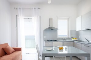 Deluxe Apartment, 1 Bedroom, Sea View | 1 bedroom, premium bedding, in-room safe, iron/ironing board - Vuelle Residence (Capo d'Orlando)