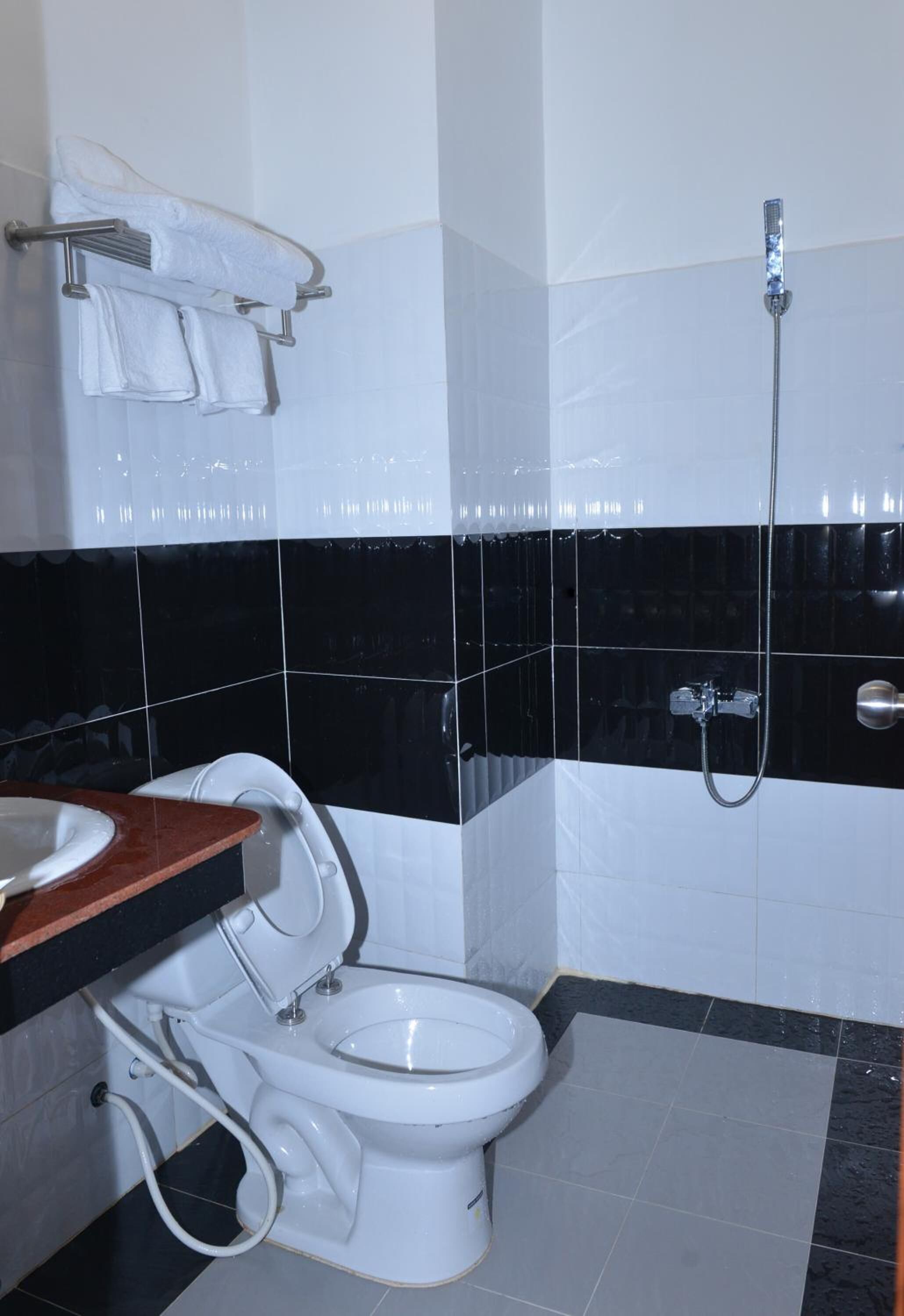 shower, free toiletries, slippers, towels