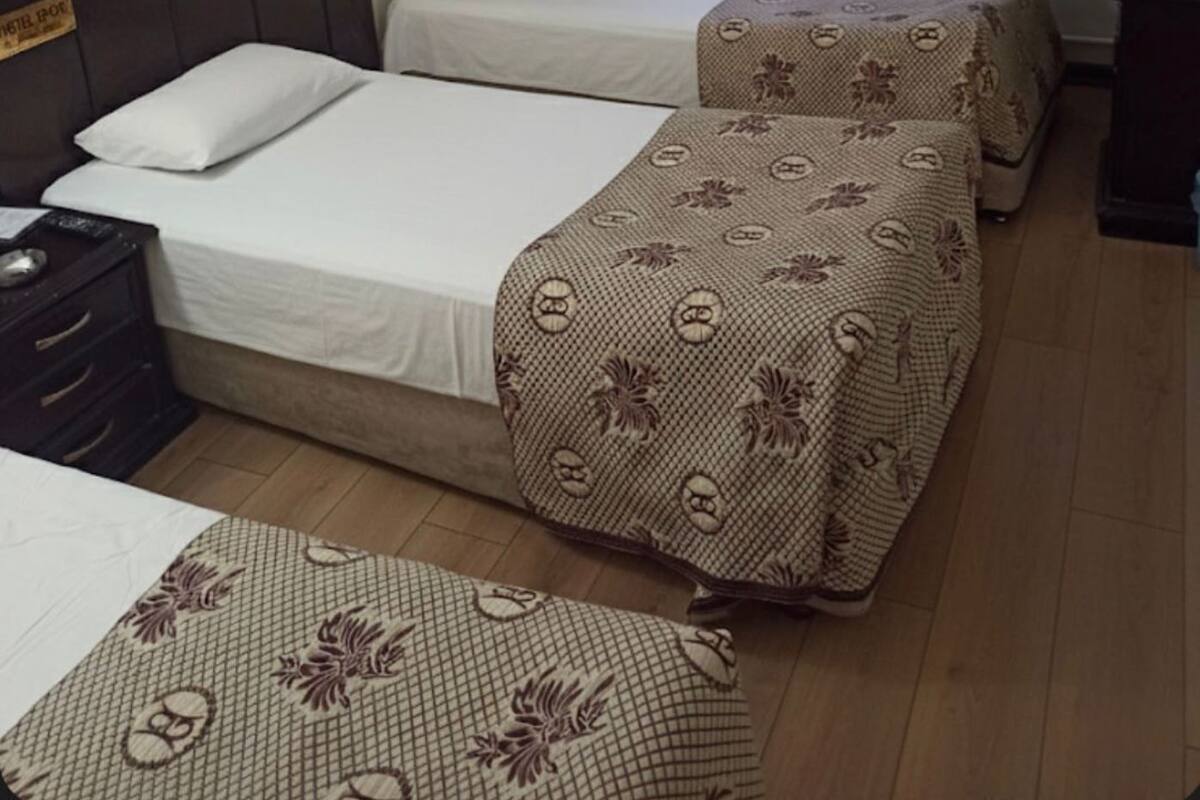 Triple Room | Premium bedding, soundproofing, WiFi (free), bed sheets