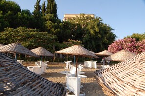 Private beach, sun loungers, beach umbrellas, beach bar