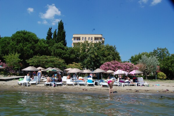 Private beach, sun loungers, beach umbrellas, beach bar