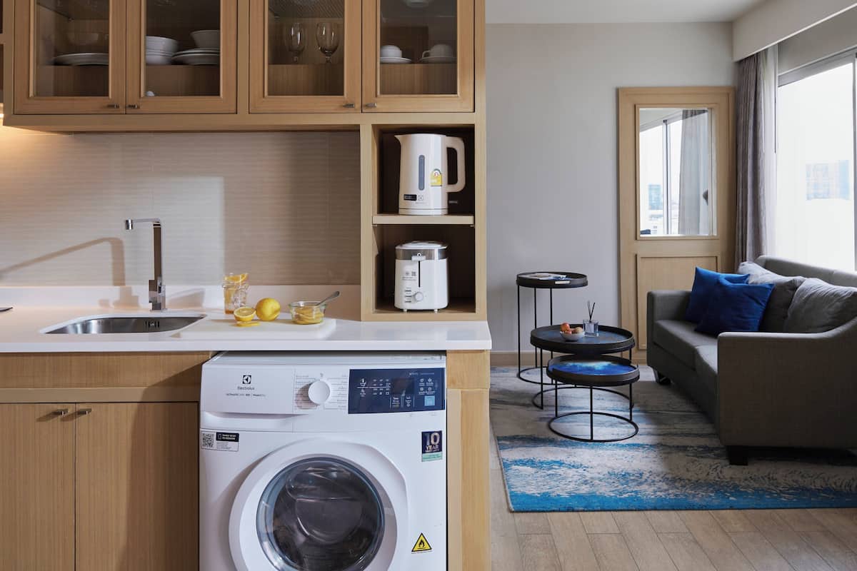 Apartment, 1 Bedroom, Lake View | 1 bedroom, in-room safe, desk, blackout drapes