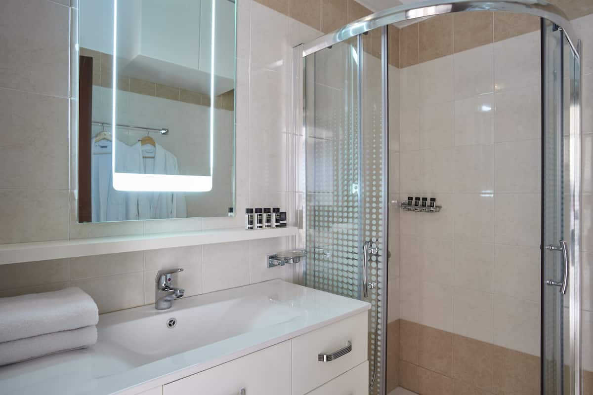 shower, free toiletries, hair dryer, dressing gowns