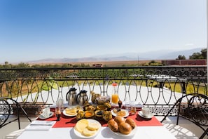 Breakfast, lunch, dinner served; Moroccan cuisine, pool views