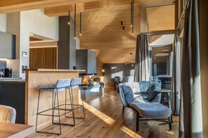 Penthouse, 2 Bedrooms, Sauna, Mountain View (PUREST Penthouse) | Living area | Flat-screen TV, MP3 dock, heated floors - Premium Apartment Resort PUREST (Achenkirch)