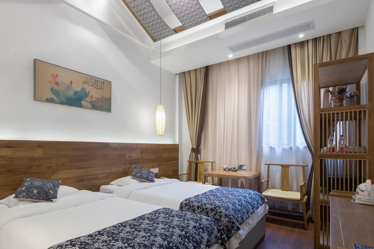 Superior Twin kamer | Luxe beddengoed, donsdekens, pillowtop-bedden, een kluis op de kamer