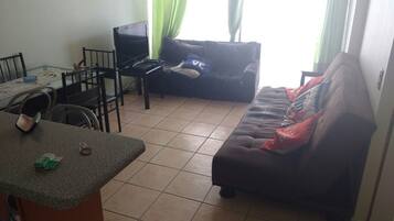 Apartment, 2 Bedrooms | Living area | Flat-screen TV