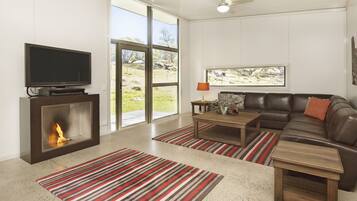 Chalet, 2 Bedrooms | Living area | Flat-screen TV, fireplace, DVD player