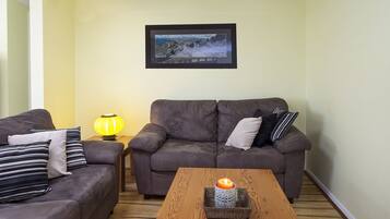 Apartment, 2 Bedrooms | Living room | 50-inch flat-screen TV with digital channels, TV