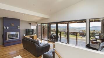 Apartemen, 3 kamar tidur | Area keluarga | TV layar datar dan pemutar DVD