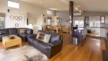 Apartment, 3 Bedrooms | Living area | Flat-screen TV, DVD player