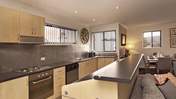 Apartment, 3 Bedrooms | Private kitchen | Fridge, microwave, oven, stovetop