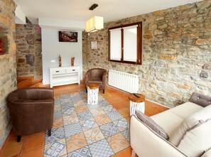 En 20-tommers Flatskjerm-TV med kabel-kanaler samt TV