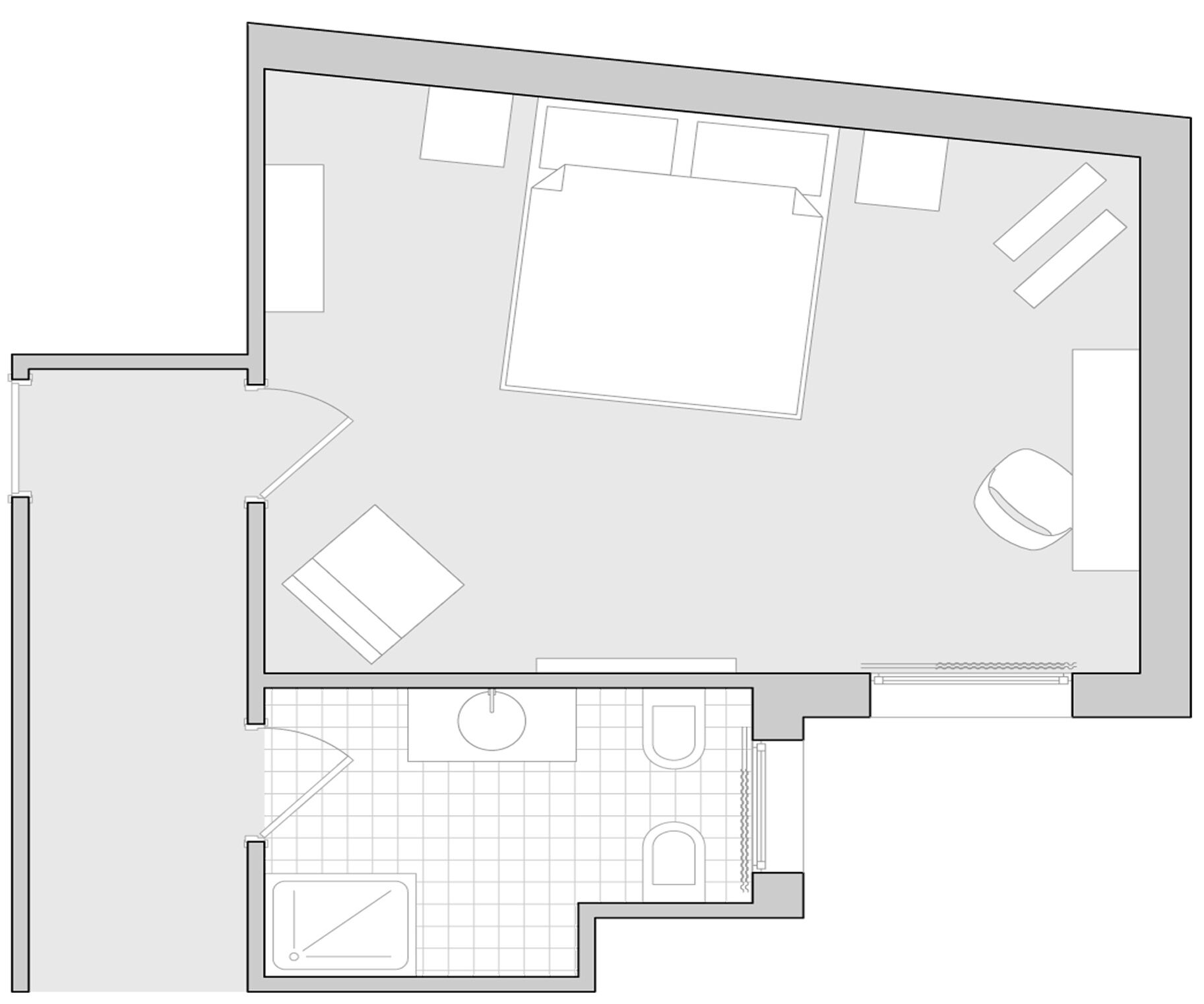 A floor plan with a central living area, two bedrooms, a bathroom, and a kitchen.