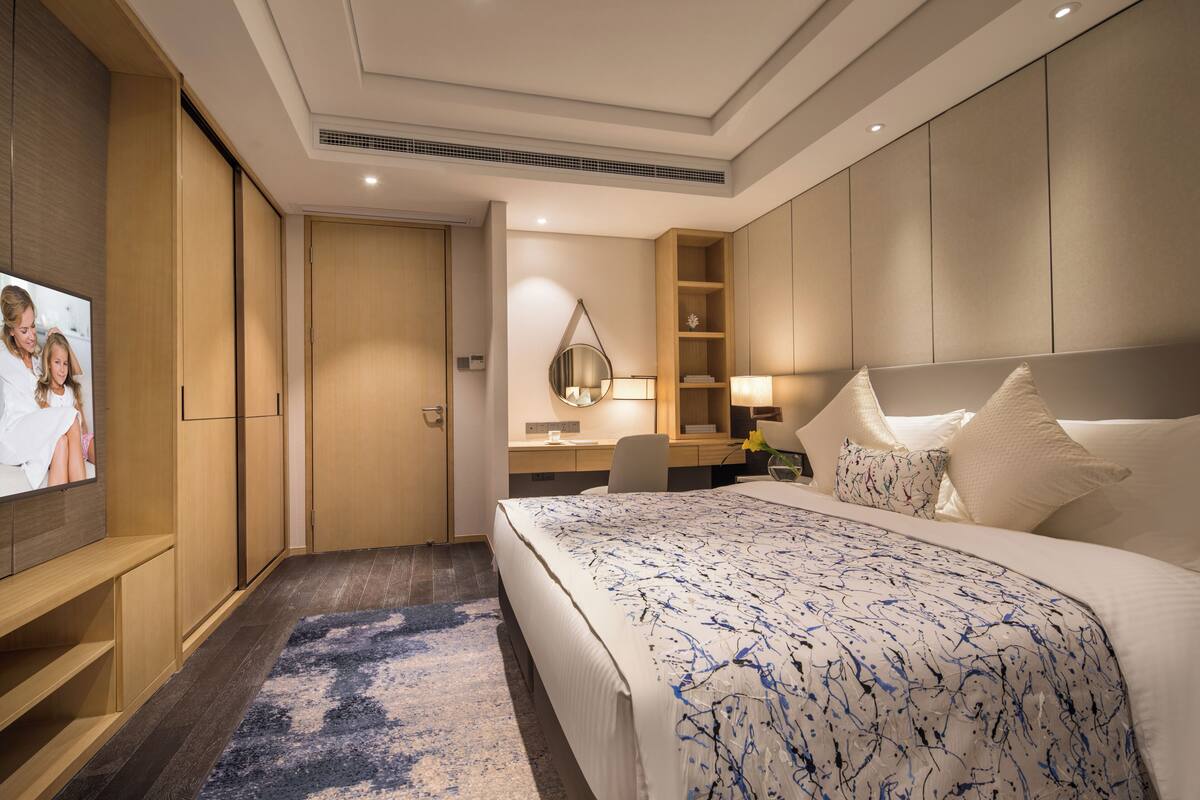 Deluxe Room, 2 Bedrooms | In-room safe, desk, iron/ironing board, bed sheets