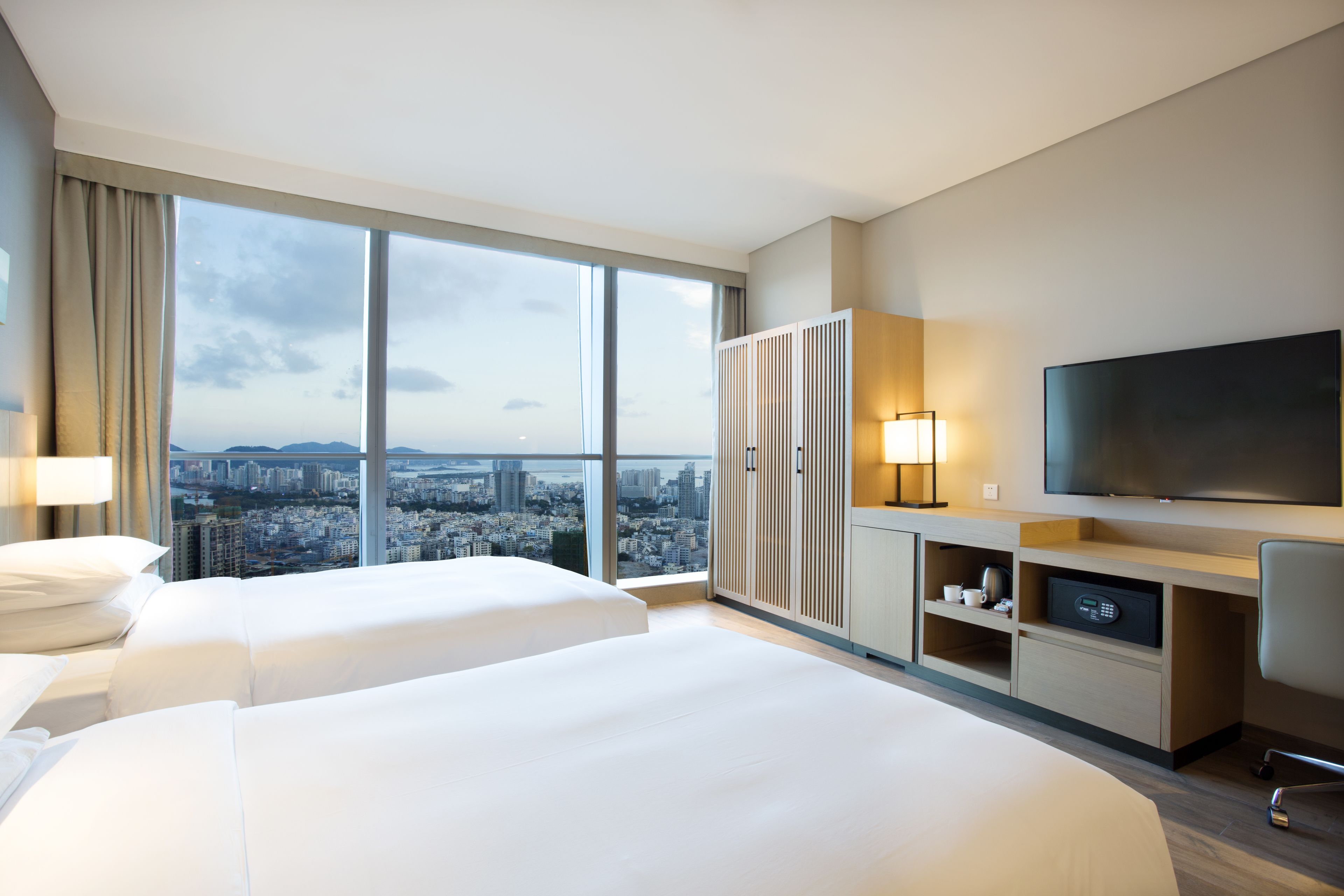 ocean view two twin beds | premium bedding, down duvets, in-room safe, desk